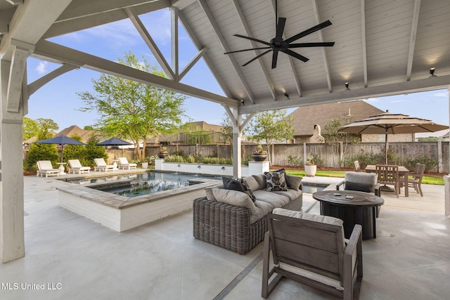 view of patio / terrace featuring ceiling fan, outdoor dining area, a fenced backyard, a gazebo, and an in ground hot tub