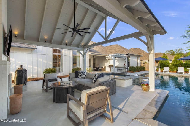 view of patio / terrace with an outdoor living space with a fire pit, ceiling fan, exterior kitchen, and an outdoor pool