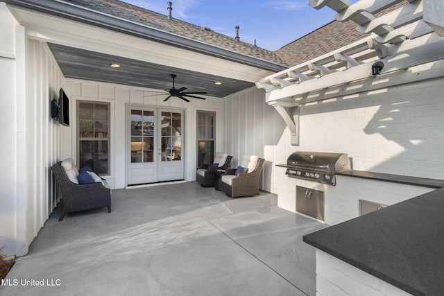 view of patio featuring area for grilling, a pergola, a ceiling fan, and french doors