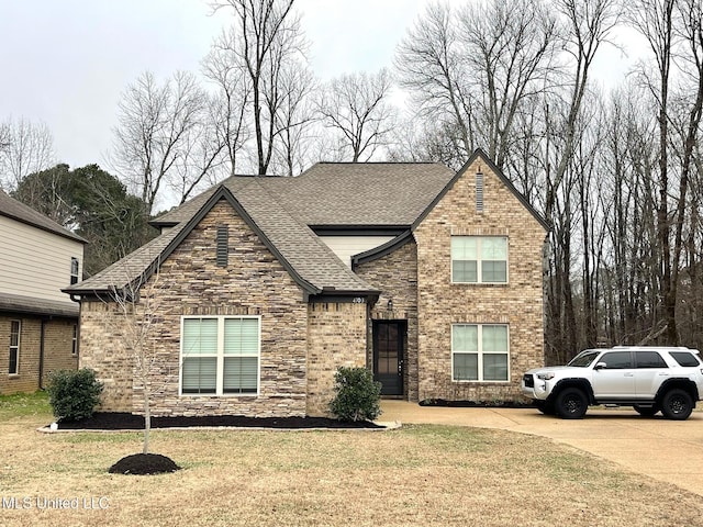 view of front of property with a front lawn