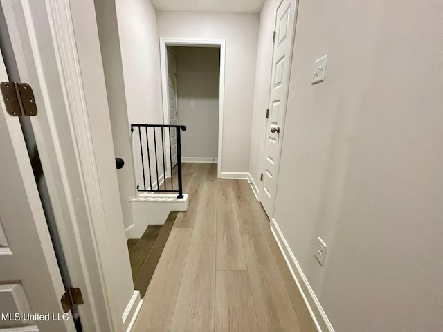 hallway featuring light hardwood / wood-style floors