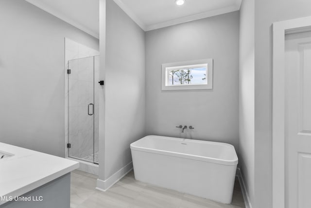 bathroom featuring a stall shower, baseboards, a soaking tub, crown molding, and vanity