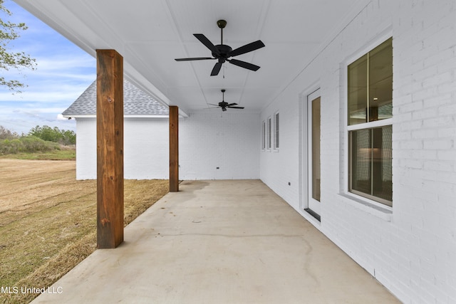 view of patio featuring ceiling fan