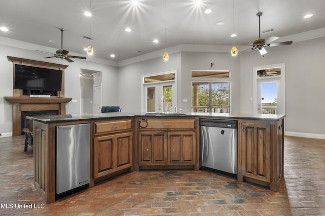 1400 Magnolia Bluff Dr, Gautier, MS 39553 - kitchen featuring dishwasher, a sink, a ceiling fan, brick flooring, and crown molding