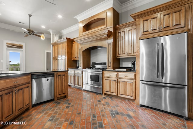 kitchen featuring appliances with stainless steel finishes, dark countertops, visible vents, and ornamental molding