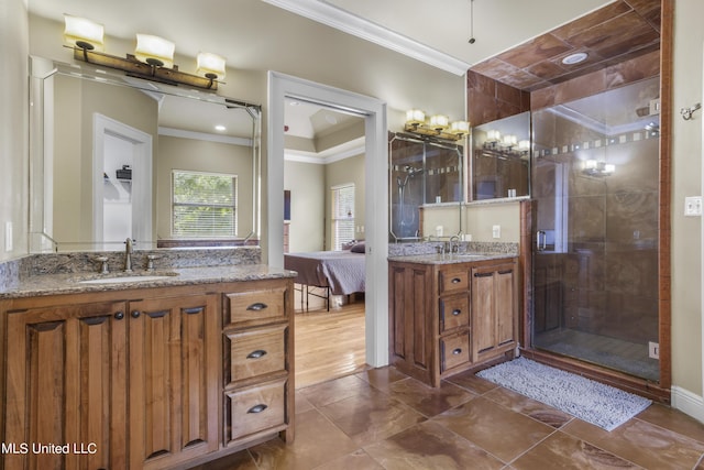 1400 Magnolia Bluff Dr, Gautier, MS 39553 - ensuite bathroom with ornamental molding, two vanities, and a shower stall