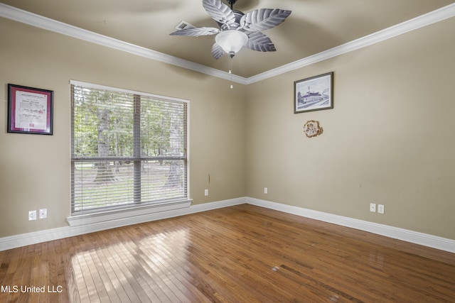 1400 Magnolia Bluff Dr, Gautier, MS 39553 - unfurnished room with healthy amount of natural light, baseboards, hardwood / wood-style flooring, and crown molding