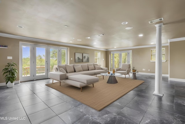 living area featuring crown molding, french doors, visible vents, and decorative columns