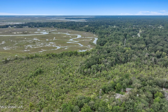 aerial view featuring a view of trees