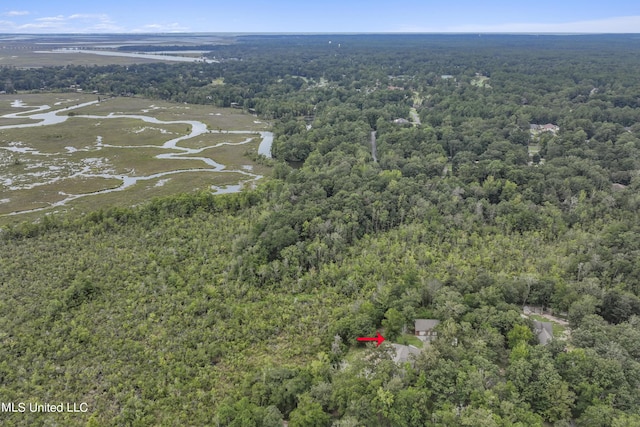 aerial view featuring a forest view