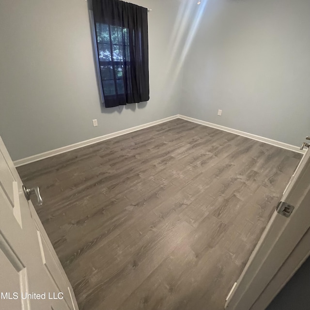 109 Evergreen Dr, Diberville, MS 39540 - spare room with dark wood finished floors and baseboards
