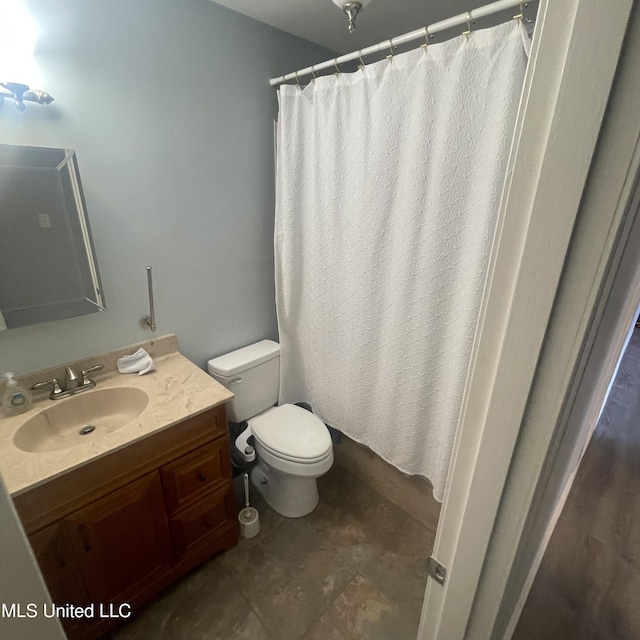109 Evergreen Dr, Diberville, MS 39540 - full bathroom featuring toilet, vanity, and a shower with shower curtain