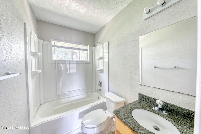 full bathroom with vanity, toilet, a textured ceiling, and shower / bathtub combination