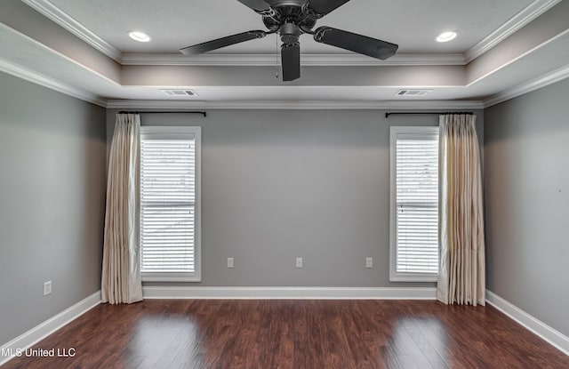 272 Hidden Hills Pkwy, Brandon, MS 39047 - empty room with a raised ceiling, healthy amount of natural light, crown molding, wood finished floors, and a ceiling fan