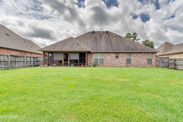 272 Hidden Hills Pkwy, Brandon, MS 39047 - back of house with a fenced backyard, a shingled roof, and brick siding