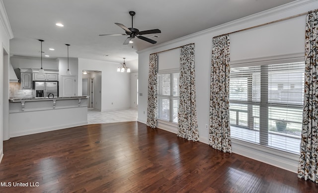 272 Hidden Hills Pkwy, Brandon, MS 39047 - unfurnished living room featuring ceiling fan, a chandelier, recessed lighting, light wood finished floors, and ornamental molding