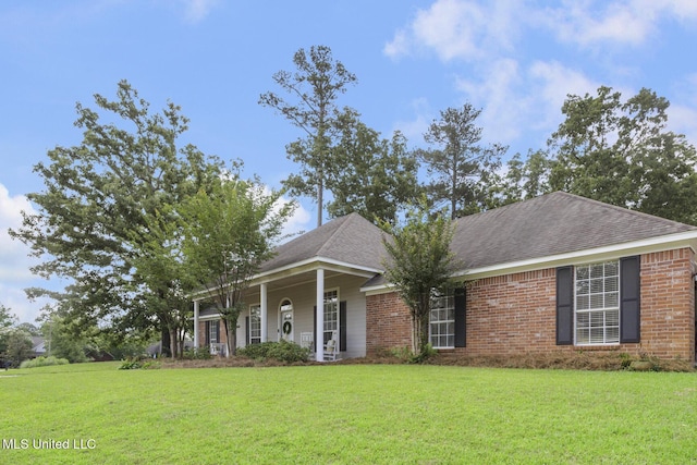 251 Greensview Dr, Brandon, MS 39047 - view of front of property with a front yard, brick siding, and a shingled roof
