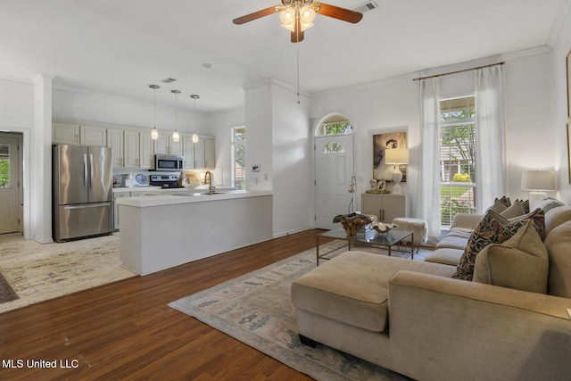 251 Greensview Dr, Brandon, MS 39047 - living room with plenty of natural light, ceiling fan, light wood-style floors, and crown molding