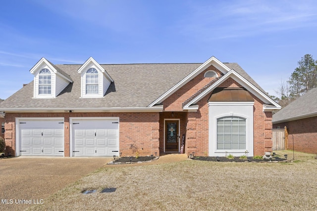 view of front of property with a garage, brick siding, driveway, and a shingled roof