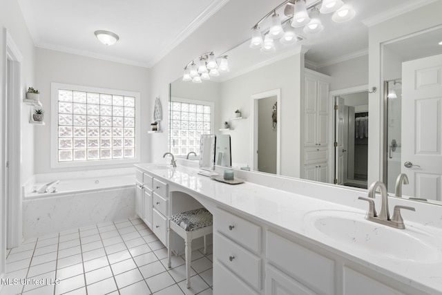 bathroom featuring a garden tub, double vanity, a sink, crown molding, and tile patterned floors