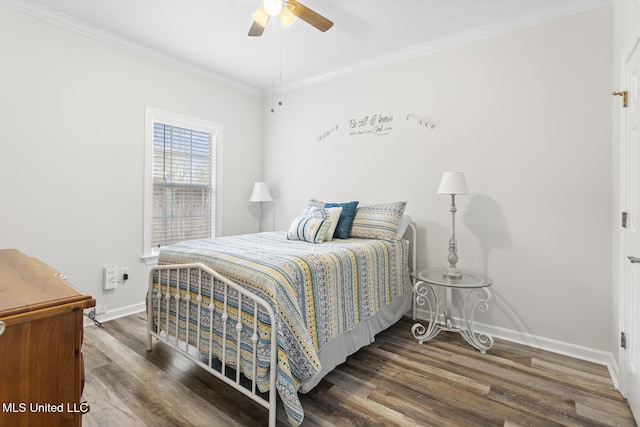 bedroom with ceiling fan, wood finished floors, baseboards, and ornamental molding