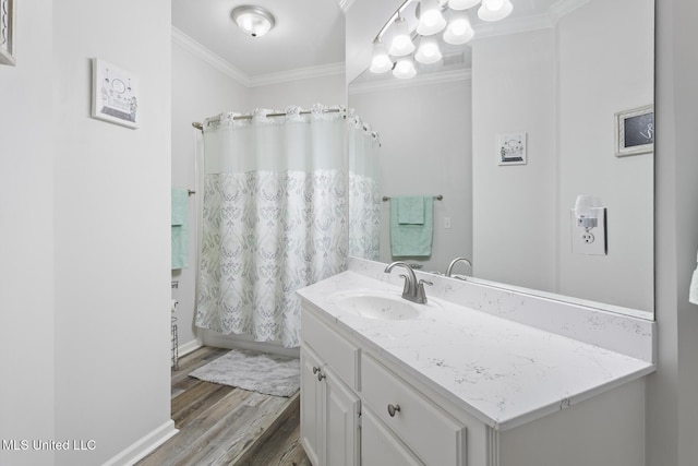 full bath with vanity, crown molding, shower / bathtub combination with curtain, and wood finished floors