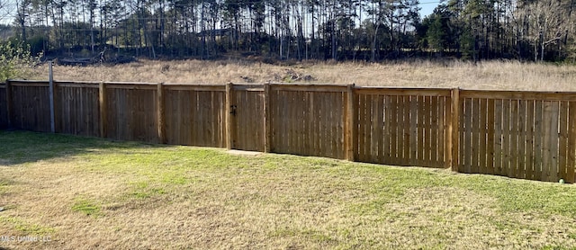 view of yard featuring fence