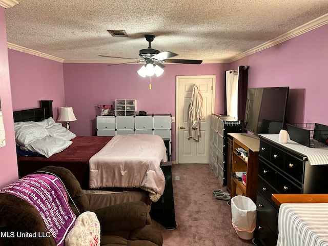 bedroom with carpet flooring, ceiling fan, ornamental molding, and a textured ceiling