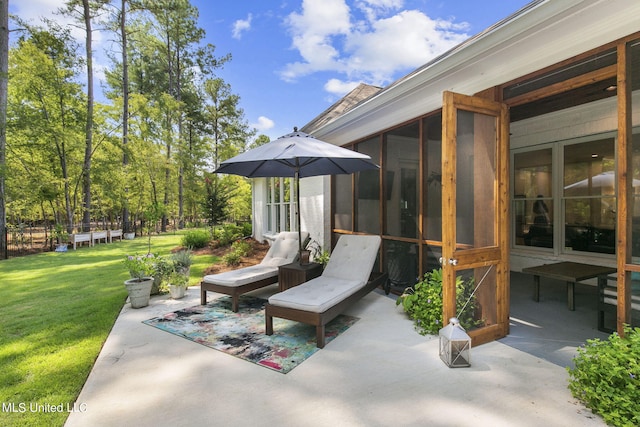 view of patio / terrace with a sunroom