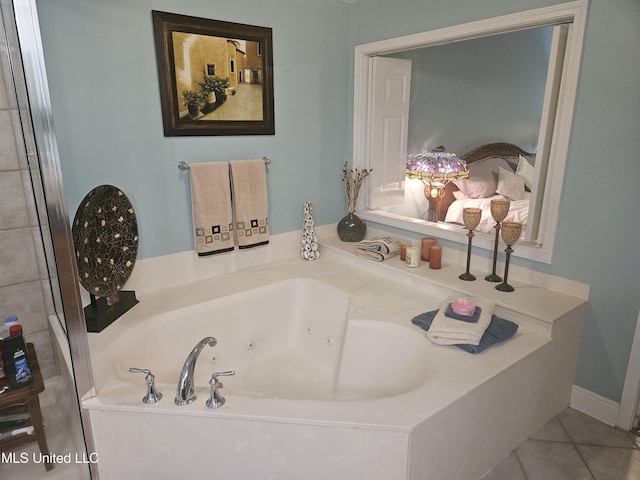 2668 Beach Blvd Unit 702, Biloxi, MS 39531 - bathroom featuring a whirlpool tub and tile patterned floors