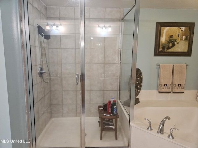 2668 Beach Blvd Unit 702, Biloxi, MS 39531 - bathroom featuring a shower stall and a tub with jets