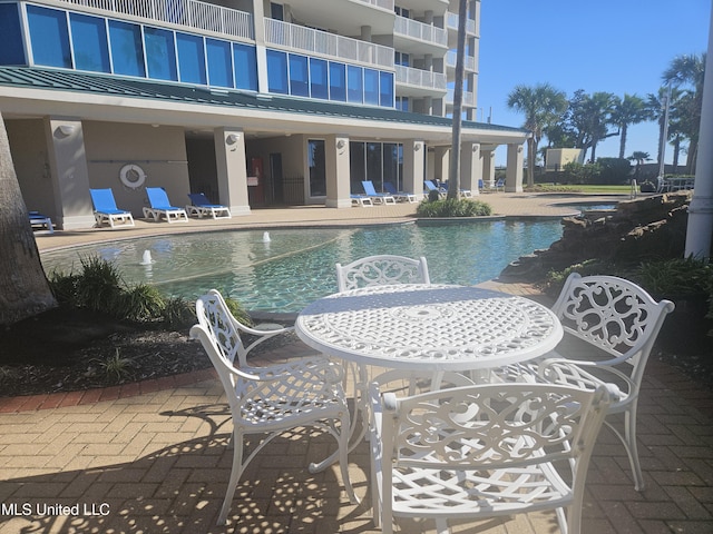 2668 Beach Blvd Unit 702, Biloxi, MS 39531 - community pool with a patio