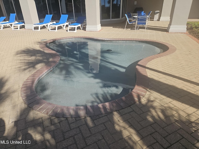 2668 Beach Blvd Unit 702, Biloxi, MS 39531 - outdoor pool with a patio area