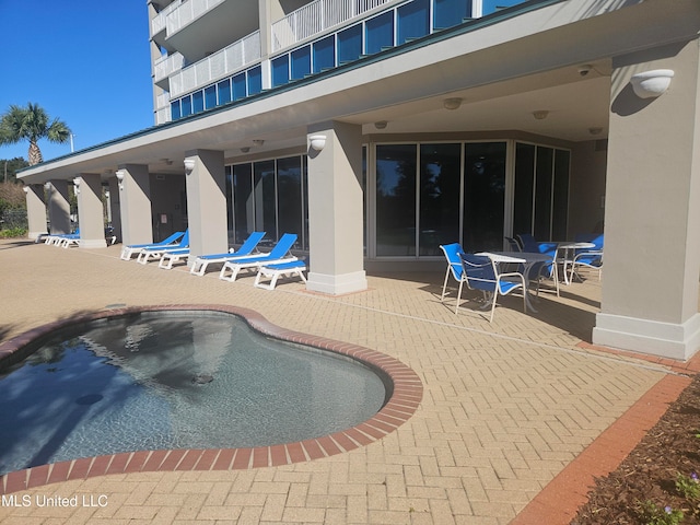 view of pool with a patio area