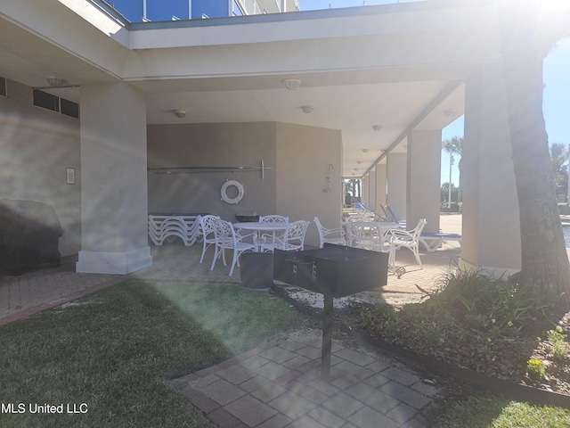 2668 Beach Blvd Unit 702, Biloxi, MS 39531 - view of patio featuring outdoor dining space