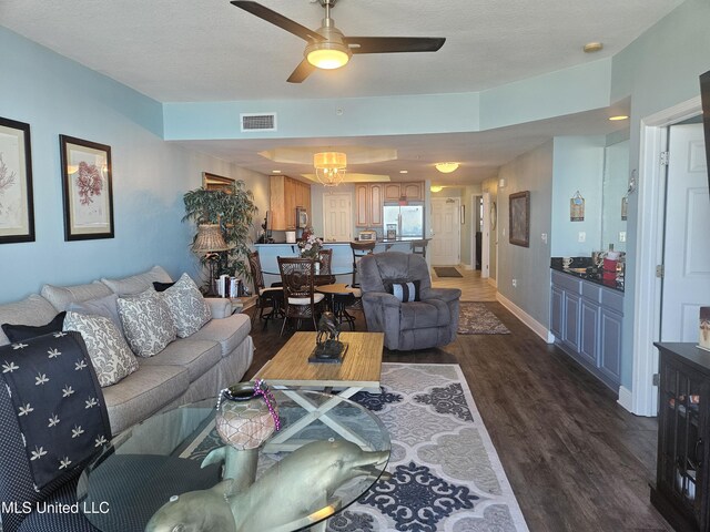 2668 Beach Blvd Unit 702, Biloxi, MS 39531 - living room featuring dark wood-style floors, ceiling fan, and baseboards