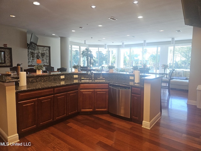2668 Beach Blvd Unit 702, Biloxi, MS 39531 - kitchen with stainless steel dishwasher, a sink, plenty of natural light, recessed lighting, and dark wood-type flooring