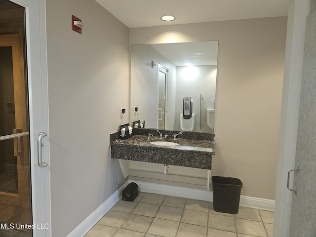 2668 Beach Blvd Unit 702, Biloxi, MS 39531 - bathroom with tile patterned floors, vanity, baseboards, recessed lighting, and a stall shower