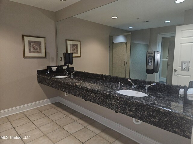 bathroom featuring tile patterned flooring