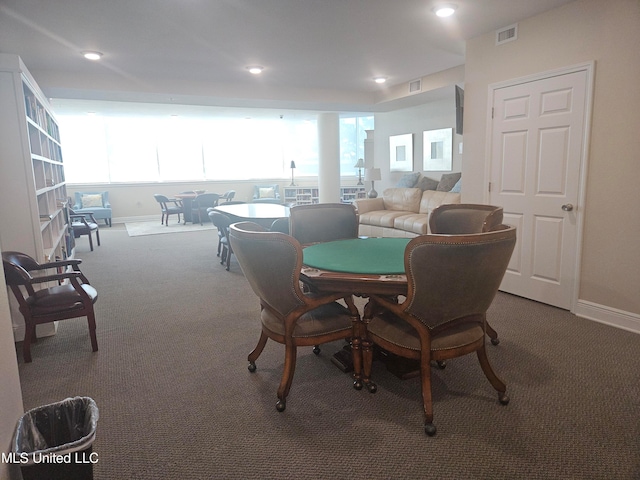 view of carpeted dining area