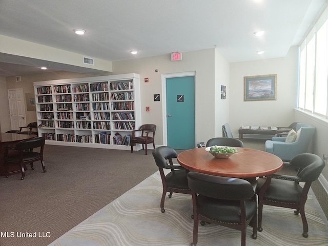 view of carpeted dining space