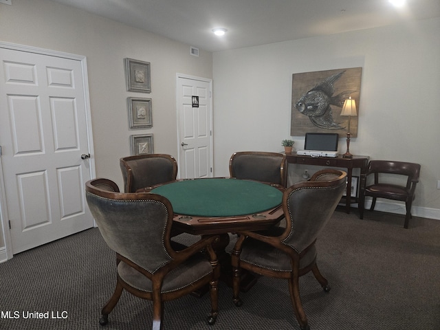 2668 Beach Blvd Unit 702, Biloxi, MS 39531 - dining room featuring dark carpet, an office area, and baseboards