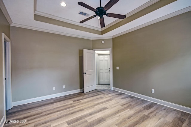 127 Rockbridge Cir, Clinton, MS 39056 - unfurnished bedroom with a raised ceiling, ornamental molding, wood finished floors, recessed lighting, and a ceiling fan