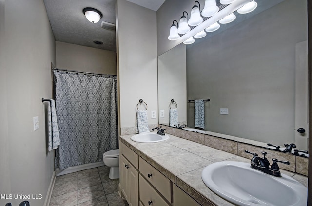 127 Rockbridge Cir, Clinton, MS 39056 - bathroom featuring double vanity, tile patterned floors, a shower with shower curtain, and a chandelier