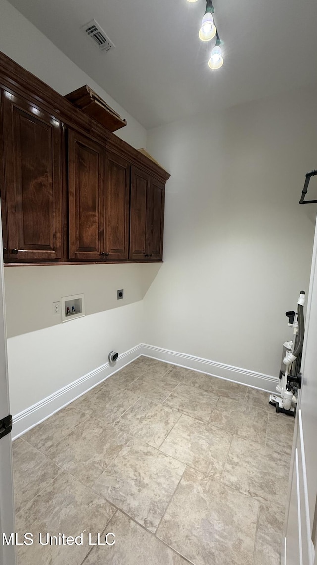 17000 River Pl, Vancleave, MS 39565 - laundry room with cabinet space, washer hookup, baseboards, and electric dryer hookup