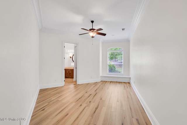 17000 River Pl, Vancleave, MS 39565 - unfurnished room featuring crown molding, a ceiling fan, light wood finished floors, and baseboards