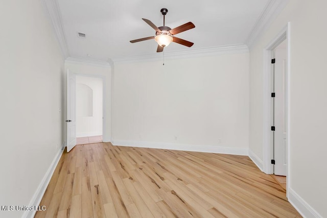 17000 River Pl, Vancleave, MS 39565 - spare room featuring a ceiling fan, ornamental molding, light wood-type flooring, and baseboards