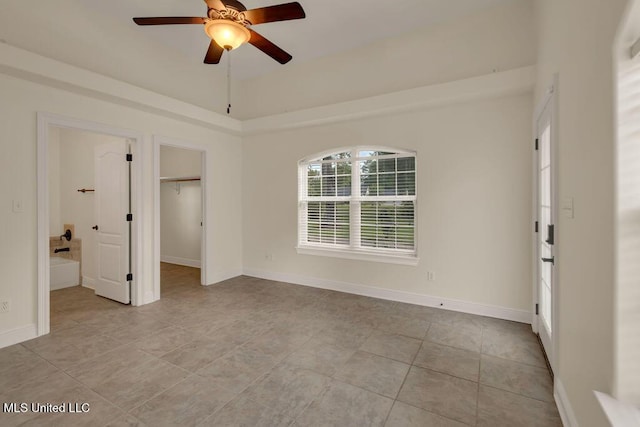 17000 River Pl, Vancleave, MS 39565 - unfurnished room featuring ceiling fan, light tile patterned flooring, and baseboards