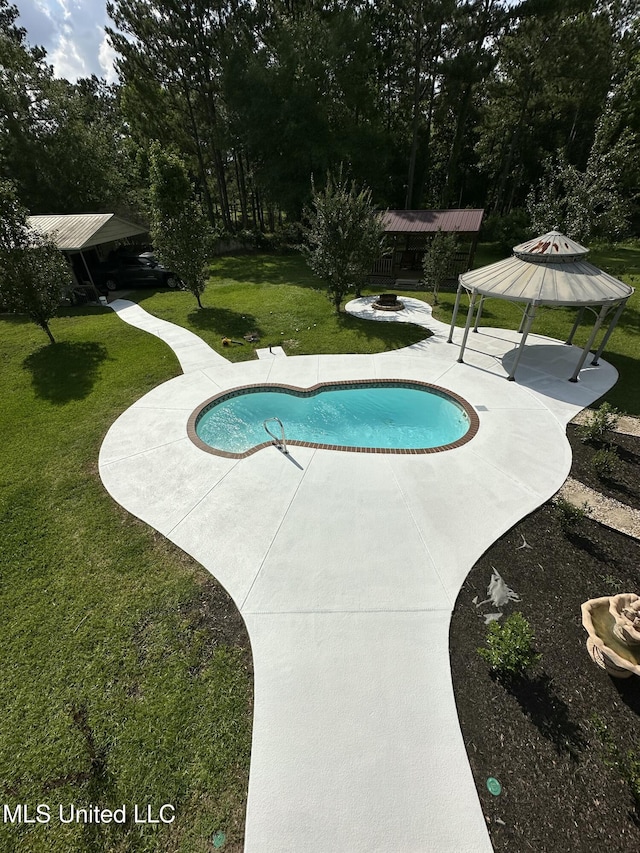 17000 River Pl, Vancleave, MS 39565 - outdoor pool featuring a gazebo, a patio area, a yard, and view of wooded area