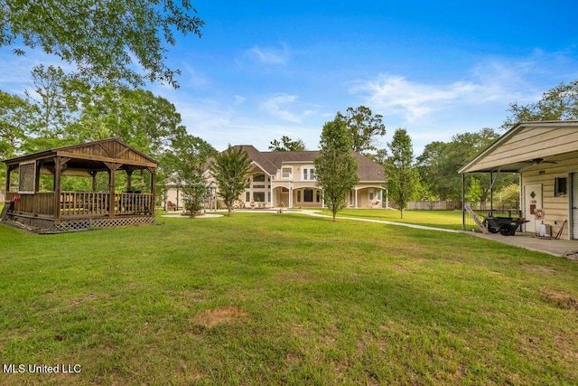 17000 River Pl, Vancleave, MS 39565 - view of green lawn with a gazebo, a ceiling fan, and a patio area